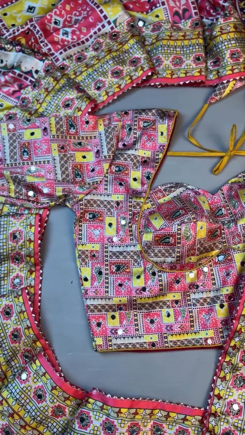 Vibrant Rajasthani Bandhani Inspired Mirror-Work Blouse and Lehenga Set