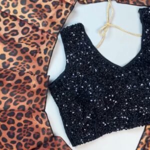 Sultry Leopard Print Organza Saree with Embellished Sequin Blouse